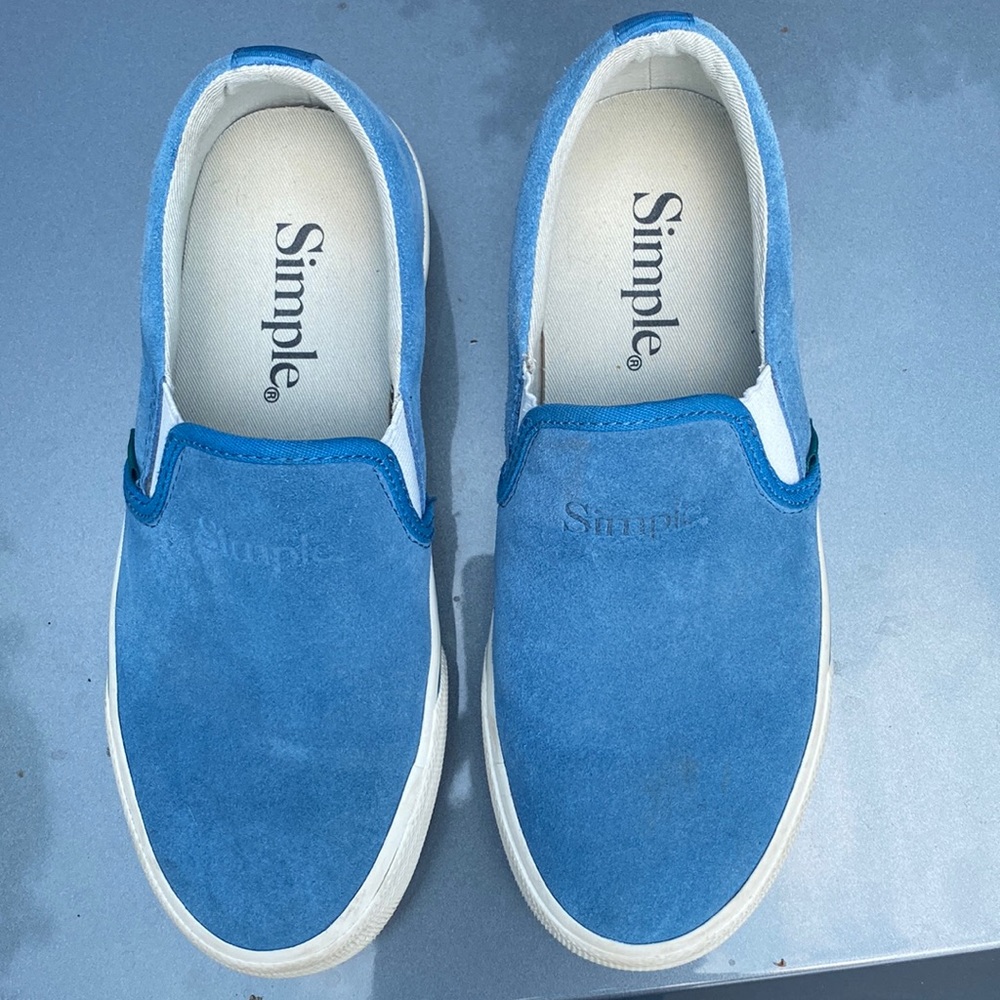 Simple sneakers - slip on boat shoe style.  Size 6, suede light blue